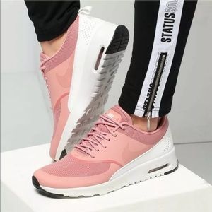 nike thea rust pink